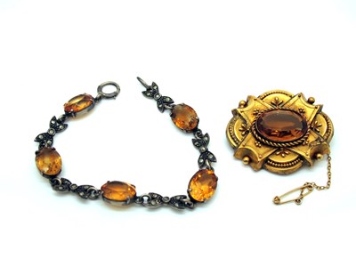 Lot 95 - A Victorian Citrine Single Stone Brooch, oval...