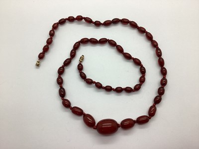 Lot 116 - A Cherry Amber Coloured Beaded Necklace, the...