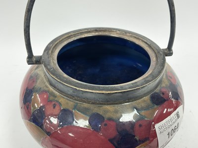 Lot 1064 - A Moorcroft Pottery Biscuit Jar and Plated...