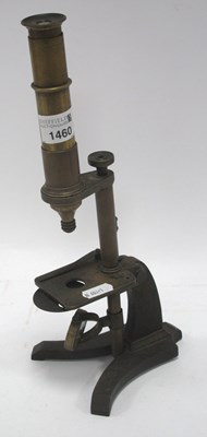 Lot 1460 - A vintage brass microscope, approx. 30cm height.