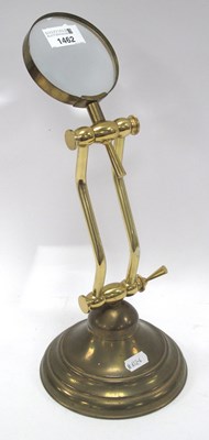 Lot 1462 - A vintage brass magnifying glass with...