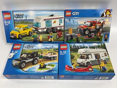 Lot 686 - Four Lego City Sets. #60057 Camper Van, #60058...