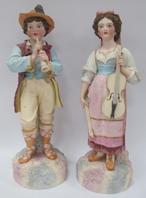 Lot 1381 - H & L Pair of Bisque Pottery Musicians, the...