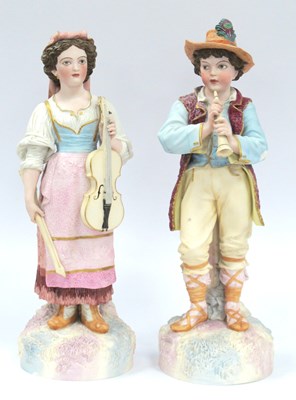 Lot 1245 - H & L Pair of Bisque Pottery Musicians, the...