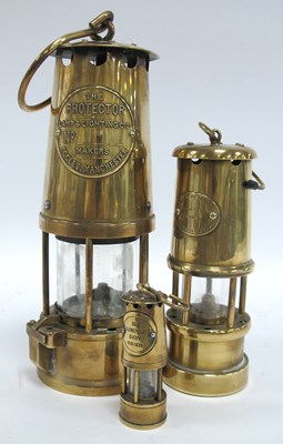 Lot 1552 - Brass Miners Lamp Protector, Eccles, 25cm high,...
