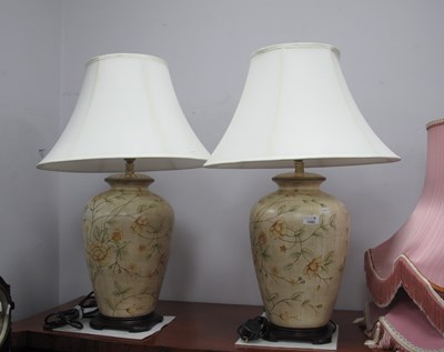 Lot 1283 - A pair of oriental style ceramic table lamps...