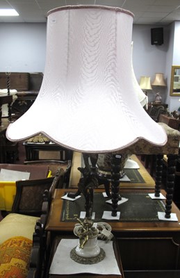 Lot 1278 - A vintage French Rococo style brass table lamp,...