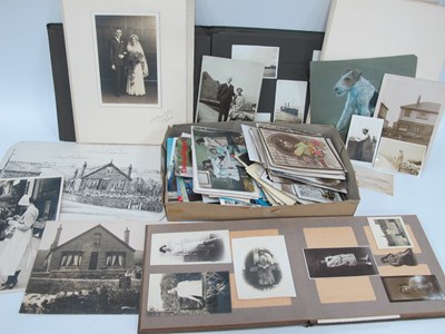 Lot 1536 - Vintage photo albums and postcards from 1920s,...