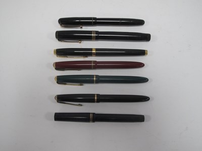 Lot 1437 - Four 14K gold nib Parker fountain pens another...