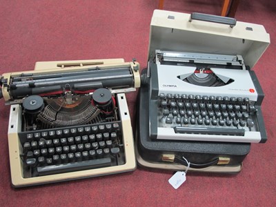 Lot 1599 - Typewriters by Olympia, including Traveller De...