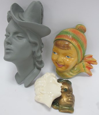 Lot 1371 - An Art Deco Plaster Mask of a Lady with a Hat,...