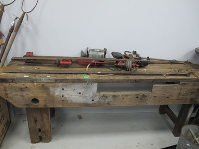 Lot 1055 - Large Wooden Work Bench, wood lathe, two shash...