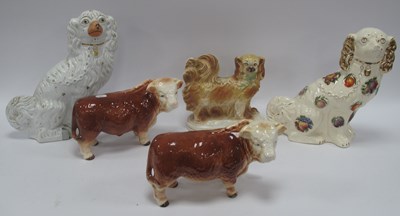 Lot 1420 - Vintage Staffordshire pottery dog figures and...