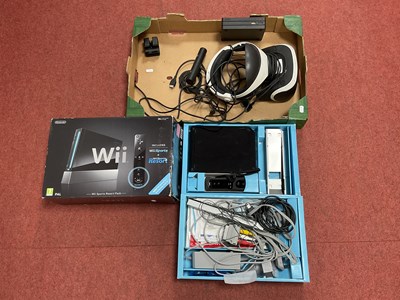 Lot 708 - A Boxed Nintendo Wii Gaming Console,...