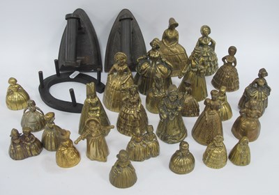 Lot 1517 - Twenty-six brass figural/character bells in...
