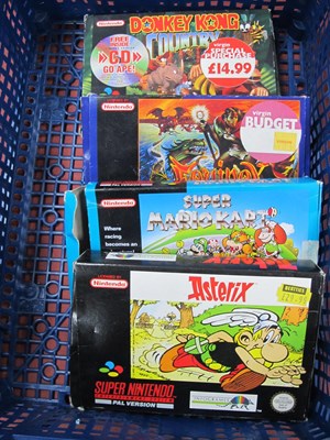Lot 566 - Four Super Nintendo Entertainment System...