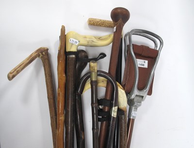 Lot 1498 - Early XX Century Walking Sticks, with a gilt...
