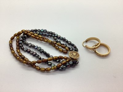 Lot 194 - A Pair of Textured Hoop Earrings, together...