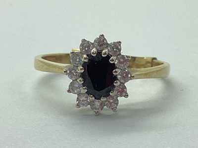 Lot 88 - A Modern Cluster Ring, of flowerhead design,...