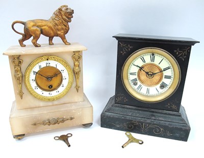 Lot 1430 - Two Antique Mantel Clocks: an onyx-cased clock...