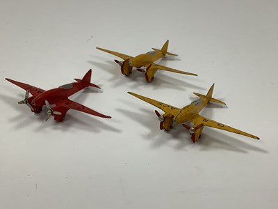 Lot 972 - Three Dinky Aircraft No 60g Light Racer, two...