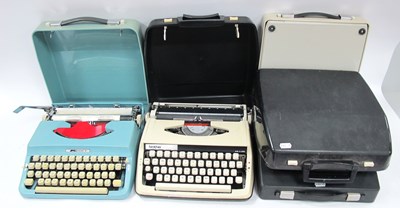 Lot 1550 - Five Cased Vintage Typewriters, including...