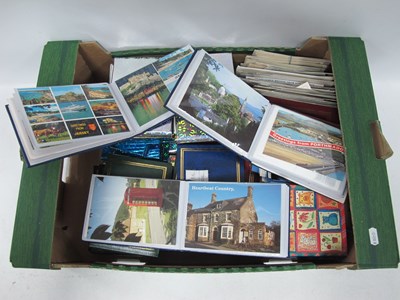 Lot 1153 - Postcards, vintage to modern in a large...