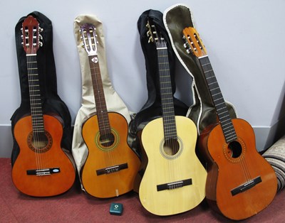 Lot 1236 - Four Classical Guitars with soft carrying bags,...