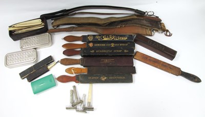 Lot 1485 - Cut Throat Razors and Strops, rolls, etc:- One...