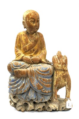 Lot 1133 - A Carved Wood Buddhist Figure of Patacara,...