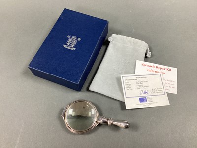 Lot 60 - Royal Mint; An Ornate Spectacle Repair Kit,...