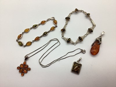 Lot 187 - A Collection of Amber Coloured Jewellery,...