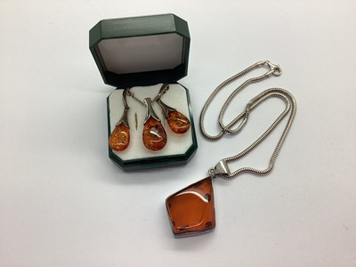 Lot 189 - A Collection of Amber Coloured Jewellery,...