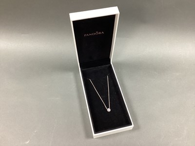 Lot 206 - Pandora; A Circular Cluster 'Floating' Pendant,...