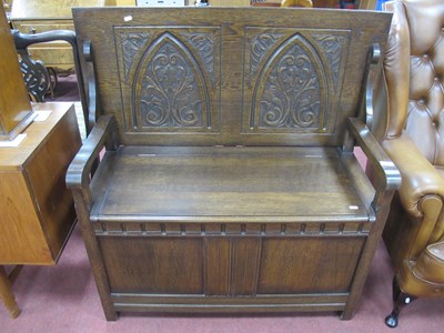 Lot 1630 - XX Century Oak Monks Bench, with a fold over...