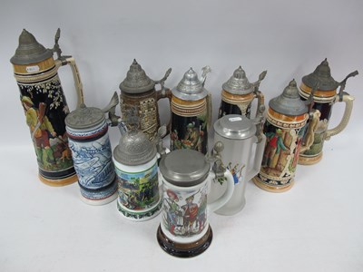Lot 1110 - Ten Large Beer Steins with Pewter Lids and...