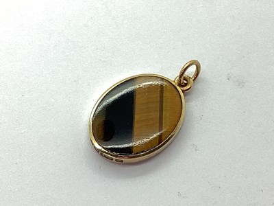 Lot 178 - David Scott Walker; A 9ct Gold Tiger's Eye...