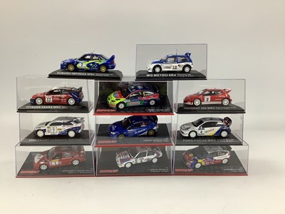 Lot 627 - Eleven 1:43rd Scale Diecast Model Rally Cars...