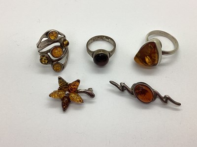 Lot 205 - A Collection of Amber Coloured and Other...