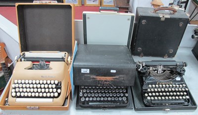 Lot 1528 - Five Cased Vintage Typewriters, including...