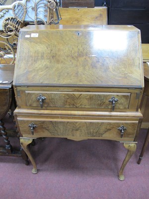 Lot 1621 - XX Century Walnut Bureau, with a fall front,...