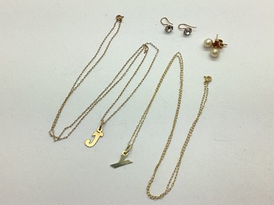 Lot 164 - A Dainty 'J' Pendant, approximately 1.2cm long,...