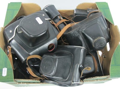 Lot 1003 - SLR Cameras, all cased, including Zenit...