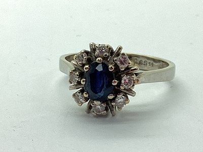 Lot 114 - A Stone Set Cluster Ring, of flowerhead design,...