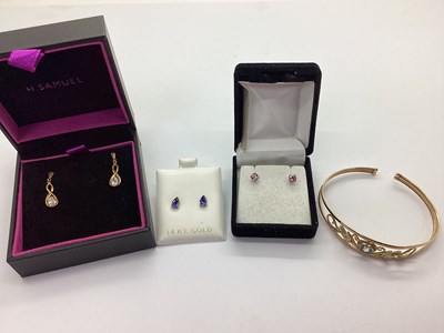 Lot 175 - A Modern Stone Set Bangle, heart shape centre,...