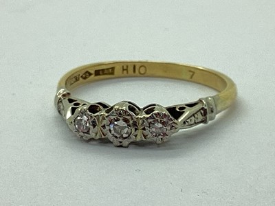 Lot 97 - A Dainty Three Stone Diamond Ring, illusion...