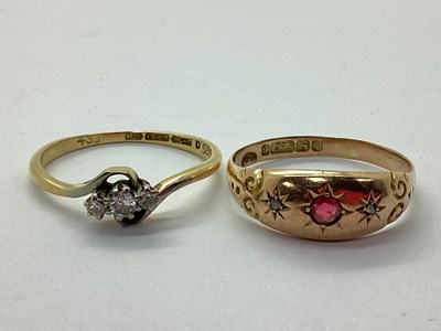 Lot 94 - A Dainty Three Stone Ring, graduated claw set...