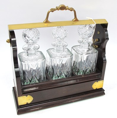 Lot 1527 - Mahogany Tantalus with brass mount and fall...