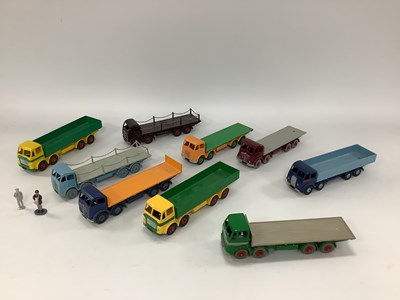 Lot 581 - Nine Original Cast Dinky Eight Wheel Lorries,...