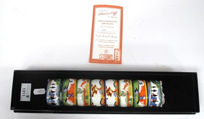 Lot 1311 - A Boxed Clarice Cliff "Napkin Ring Collection",...